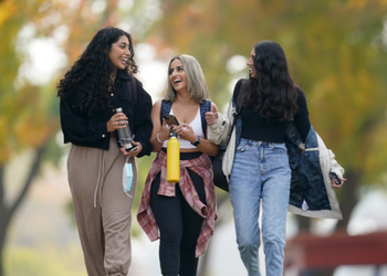 Fresno State students walking through campus